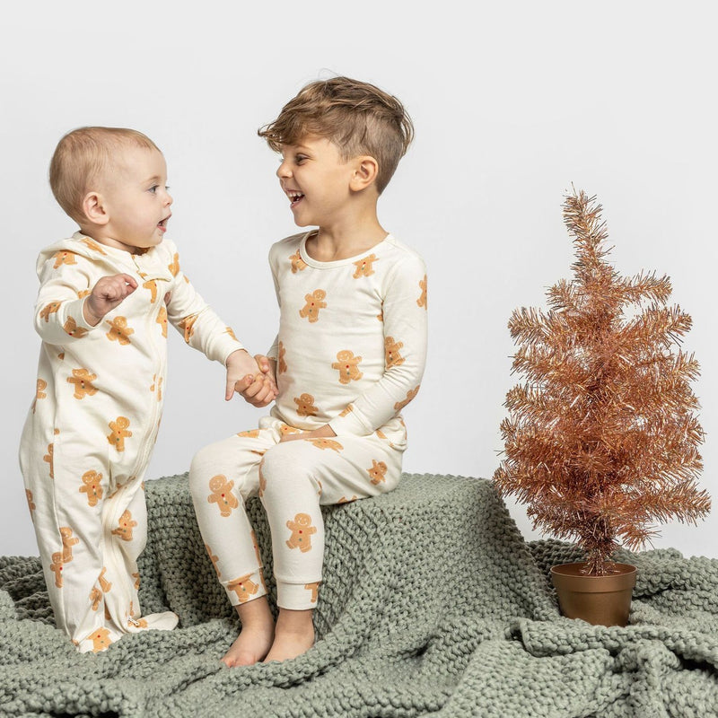Gingerbread cookie matching siblings holiday pajamas
